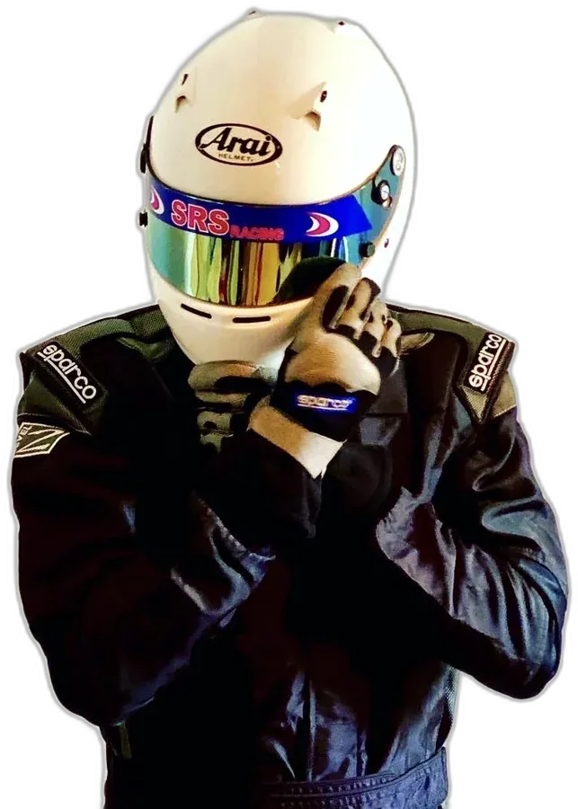 The driver in a white helmet with the SRS Racing visor strip